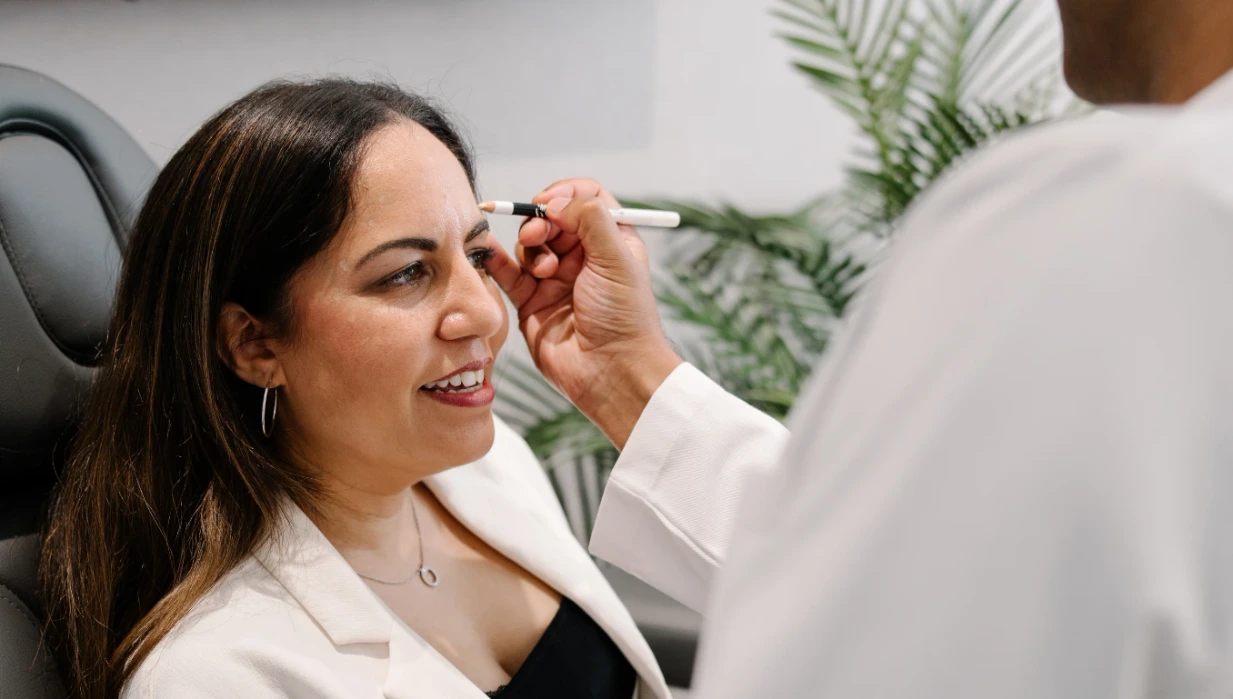 Patient receiving treatment from Dr Ashlin Alexander for skin concern