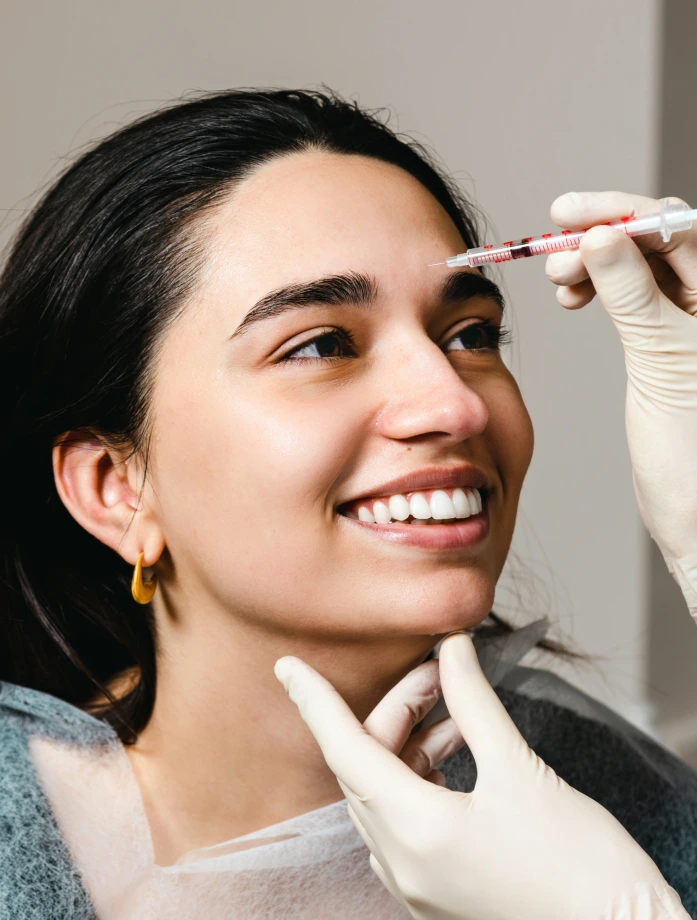 woman getting injectables botox treatment