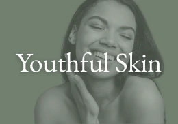 Woman smiling with no wrinkles and youthful skin