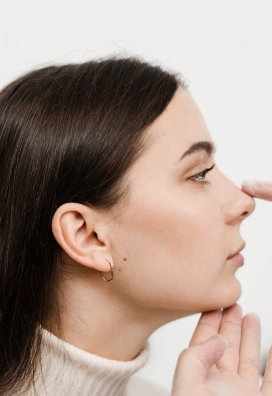 female and cosmetic surgeon liquid nose job